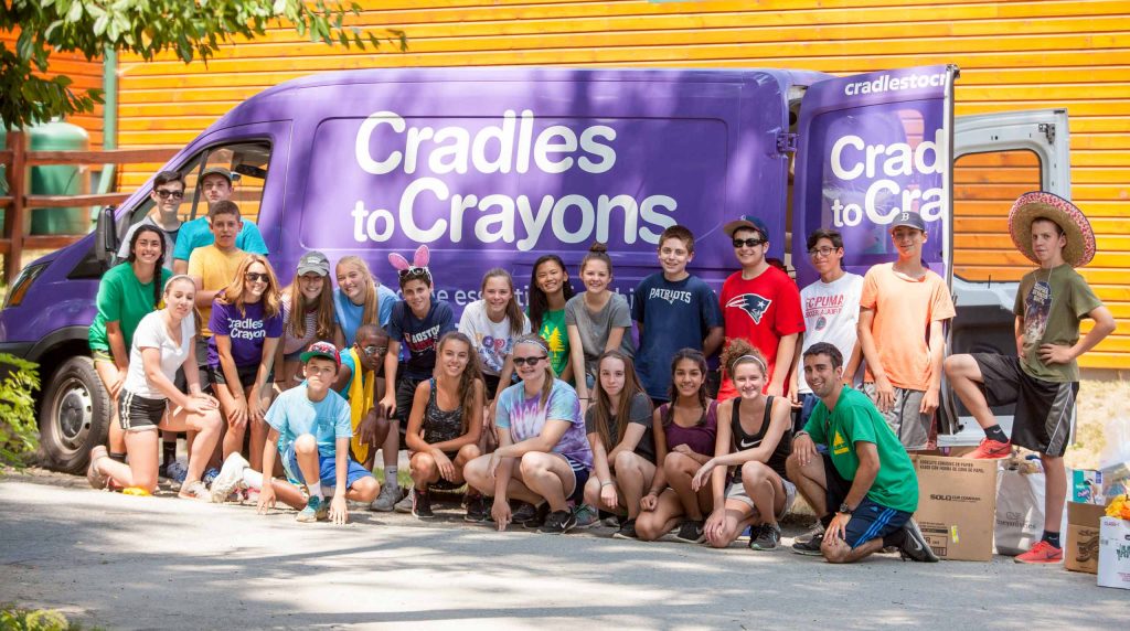 Cradles to Crayons van and teens